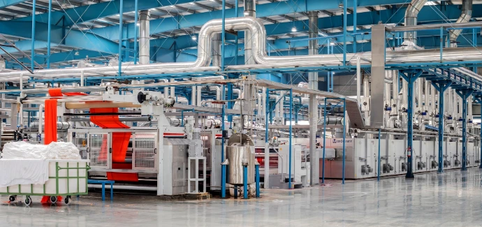 industrial textile factory with machinery and pipes